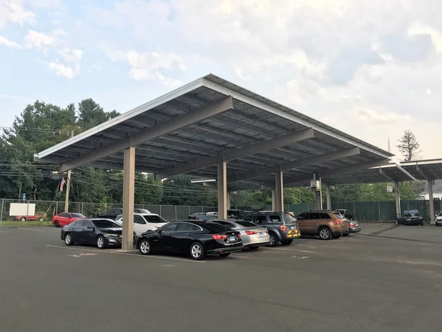 Completed Yeti solar carport showing the full canopy and parking layout