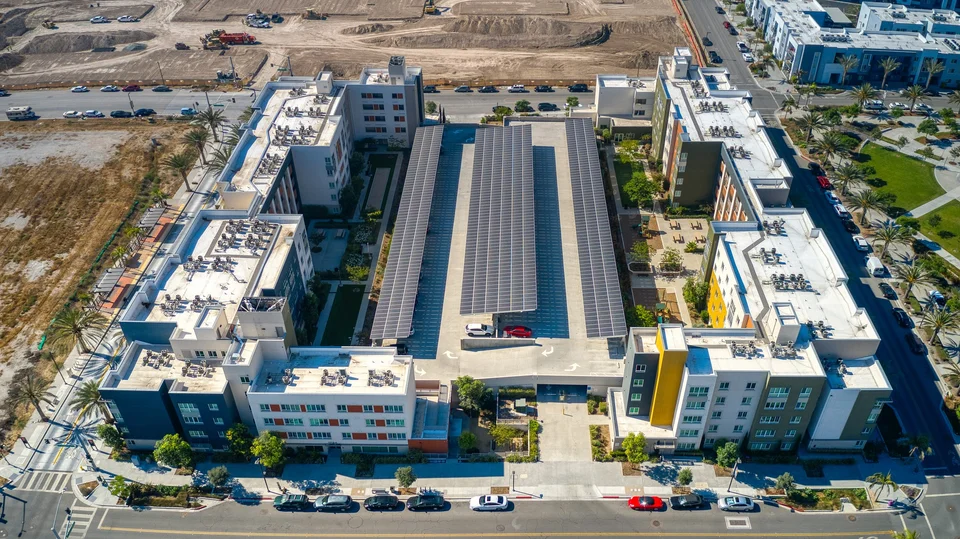 Solar parking deck between apartment buildings