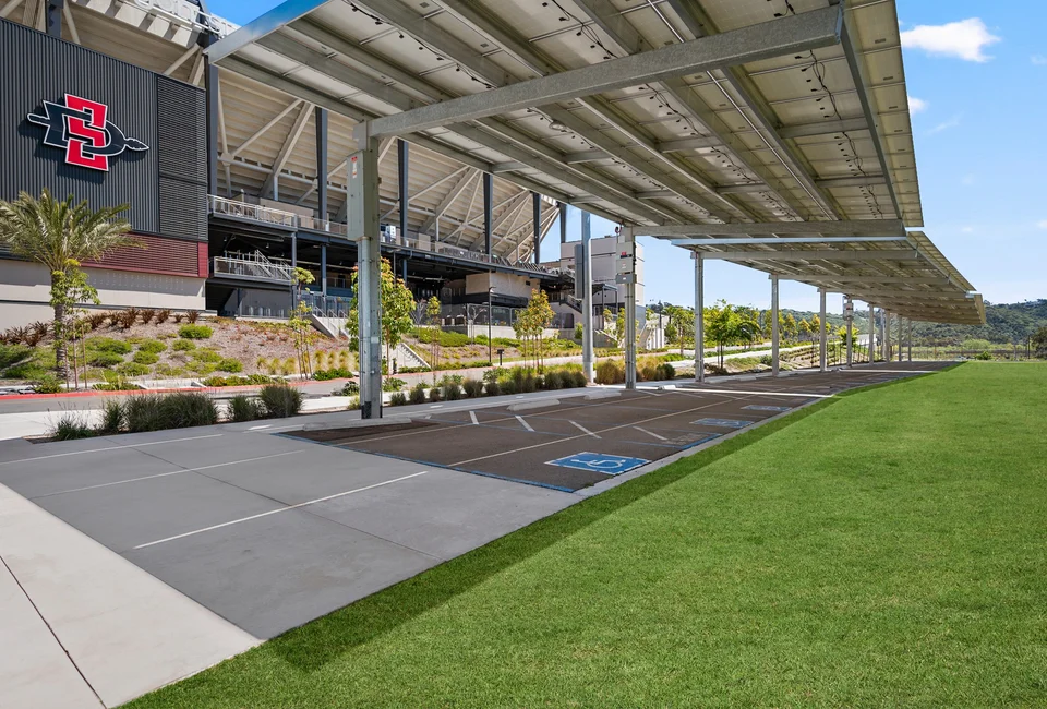 Steel solar canopy framing beside Snapdragon Stadium