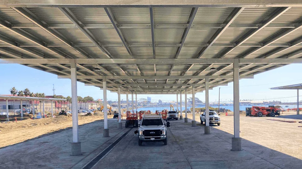 M Bar C field team installing structural steel