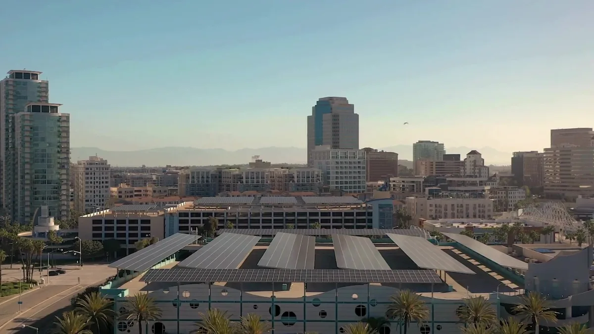 Aerial view of large-scale solar carport installations