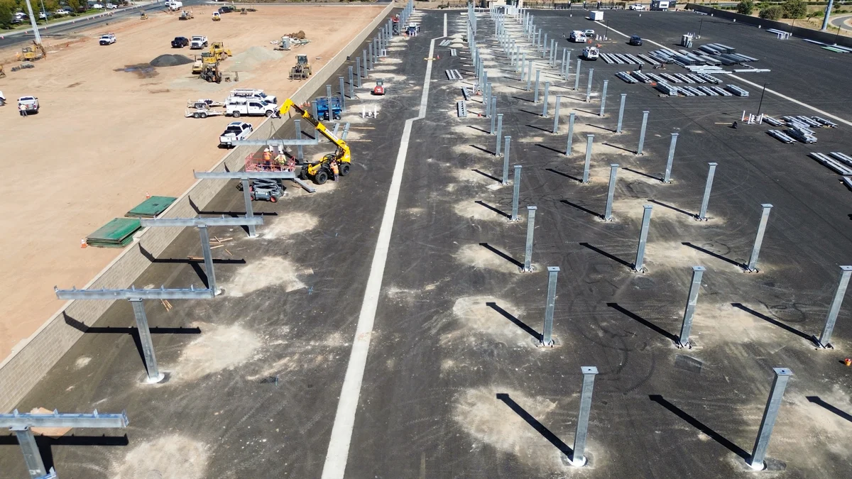 Rows of steel columns and canopy framing during construction at Crooked Creek RV and Boat
