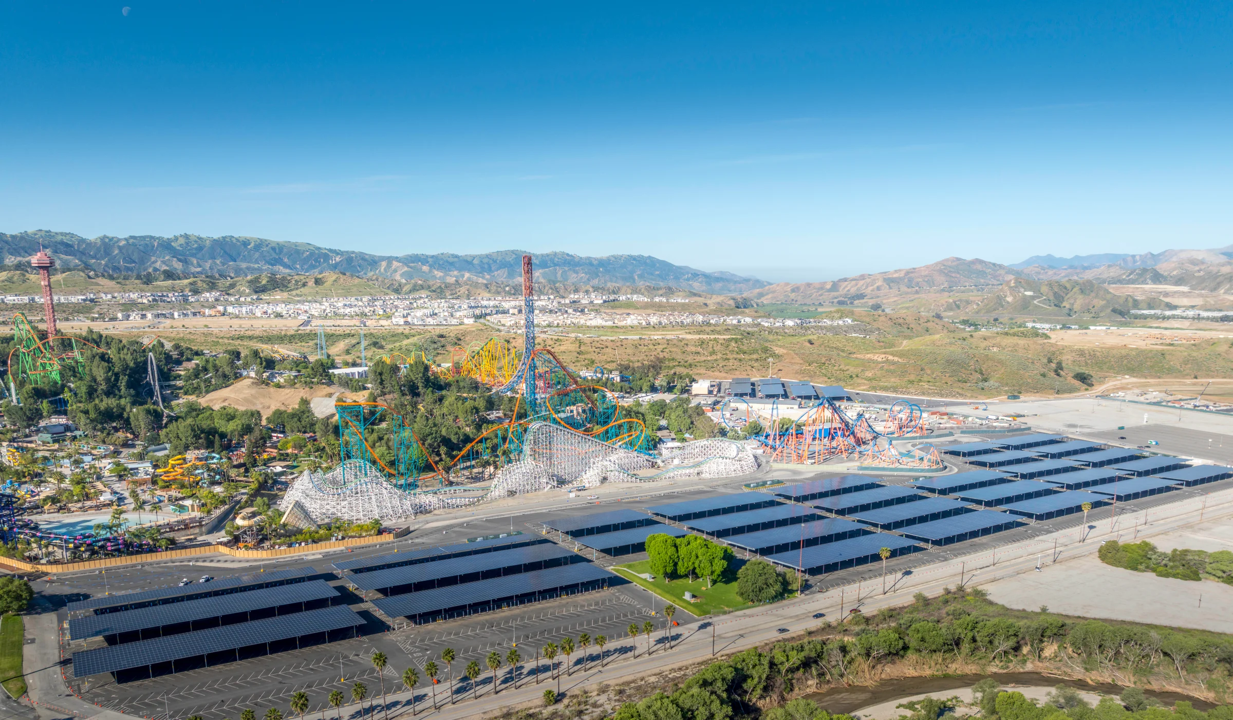 Aerial overview of completed solar carports beside the roller coasters at Six Flags Magic Mountain
